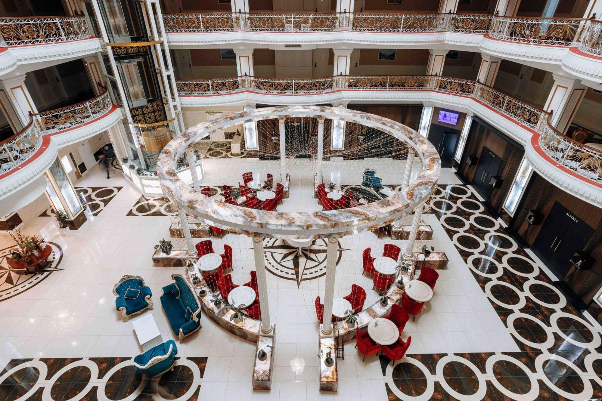 Ramada By Wyndham Shymkent Hotell Exteriör bild